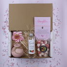 Strawberry & Rhubarb treat box with pink reed diffuser, keepsake bracelet, sweet lollipop