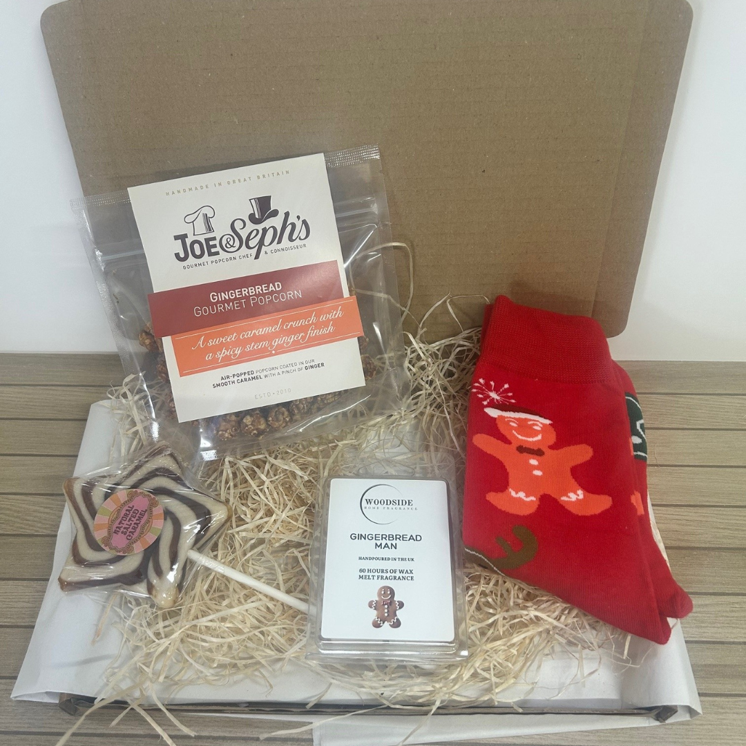 Eco-friendly Christmas Treat Box filled with festive snacks and gifts